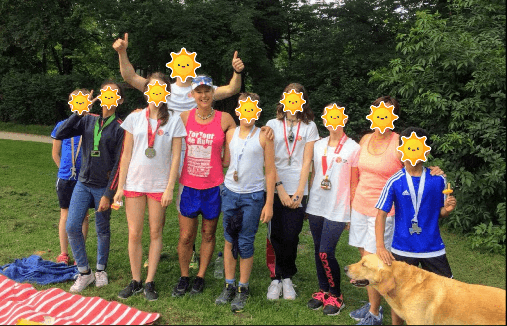 Robyn with Year 5, 6, 7, 8 and 9 English students running and learning in the park.